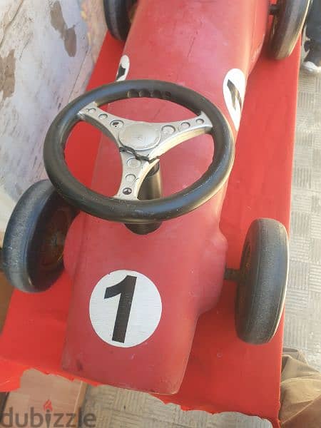 antique car formula 1 made from iron 1