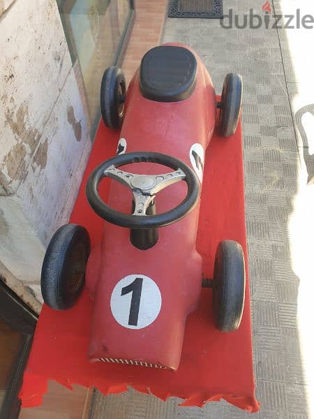 antique car formula 1 made from iron 3