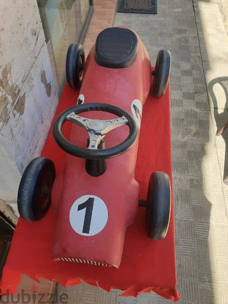 antique car formula 1 made from iron 4