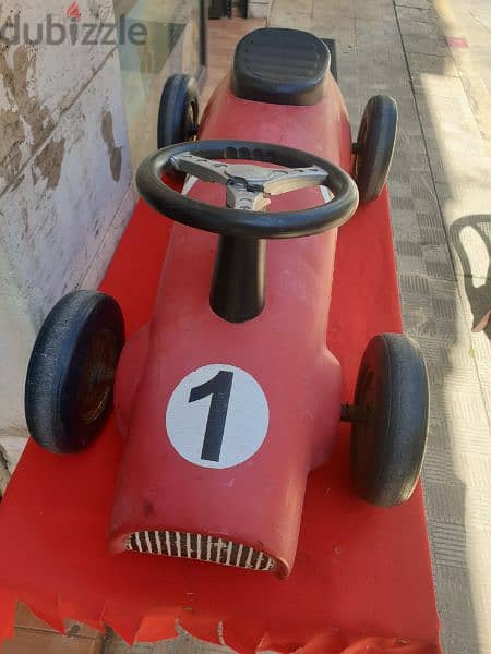 antique car formula 1 made from iron 6