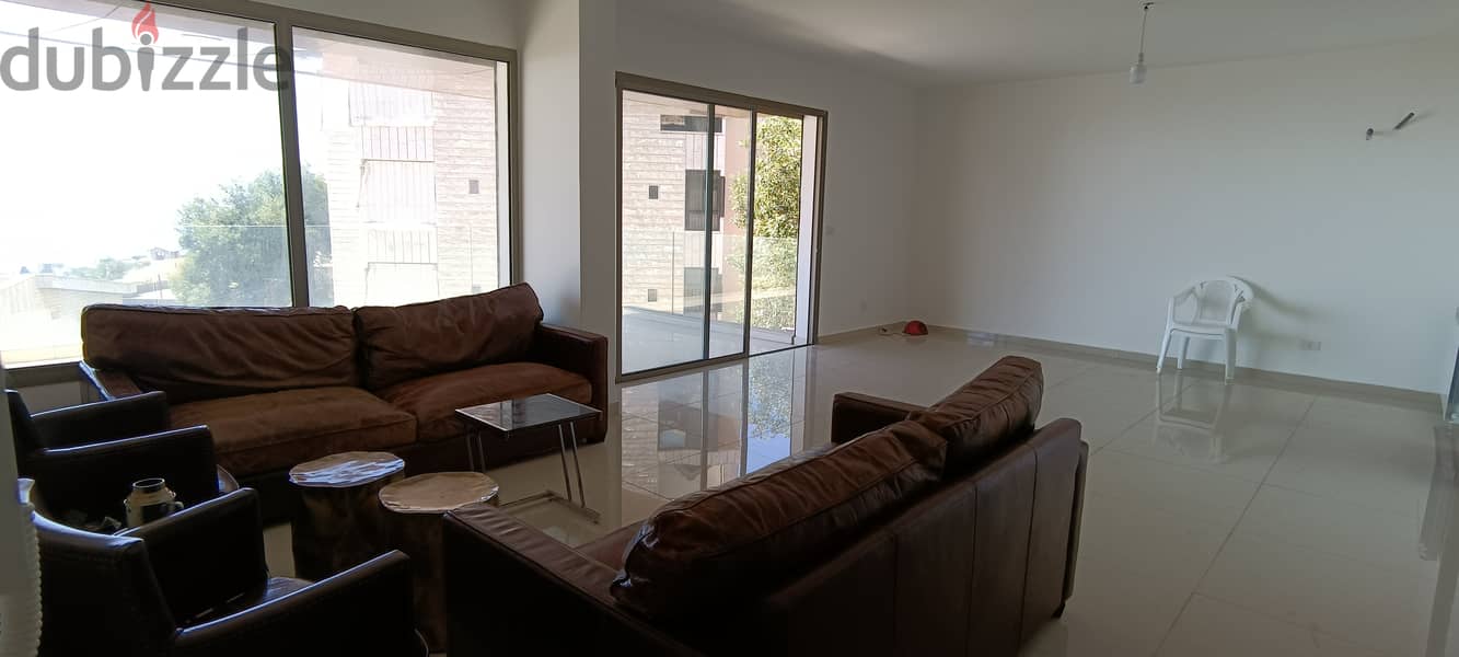 RWK142JS - Apartment For Sale In  Ballouneh - شقة للبيع في بلونة 1