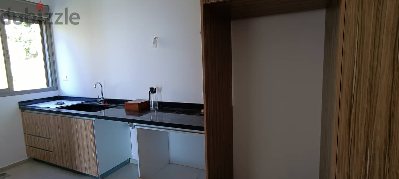 RWK142JS - Apartment For Sale In  Ballouneh - شقة للبيع في بلونة 8