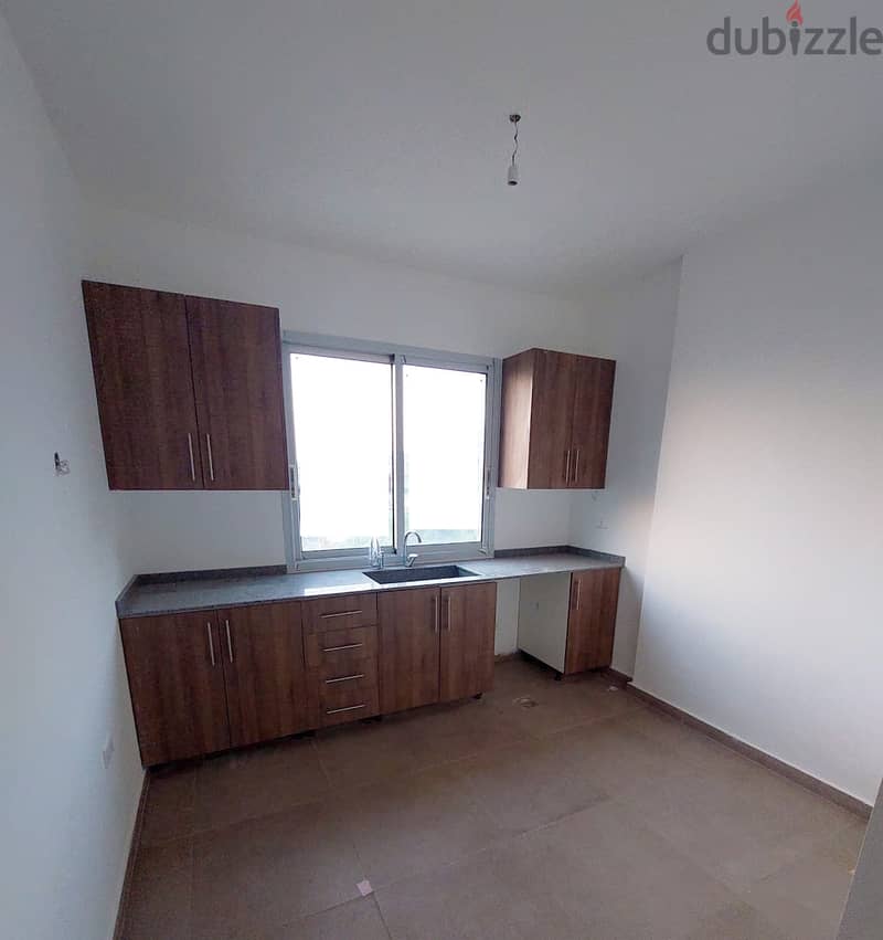 115 SQM New Apartment in Dbayeh, Metn with Mountain View 3