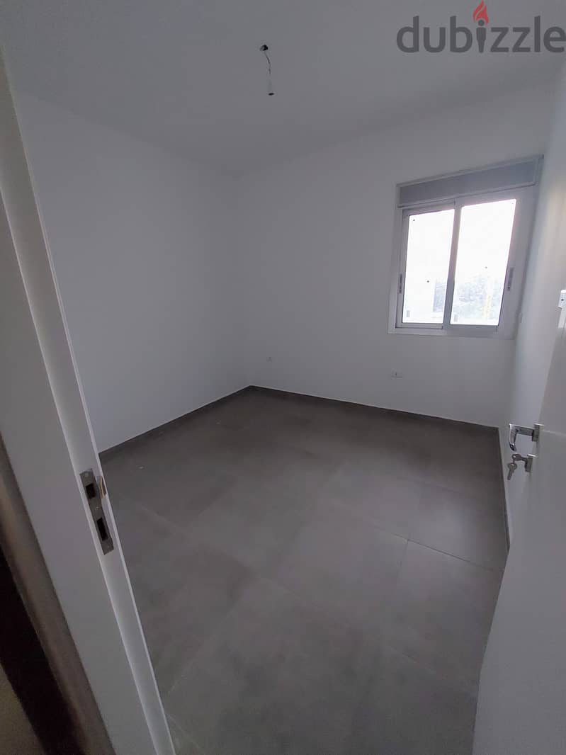 115 SQM New Apartment in Dbayeh, Metn with Mountain View 6