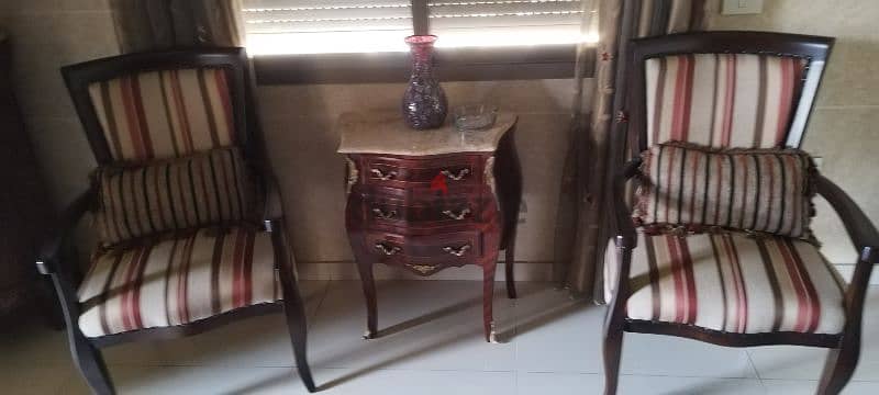 2 antiques bergeres with small antique table 1