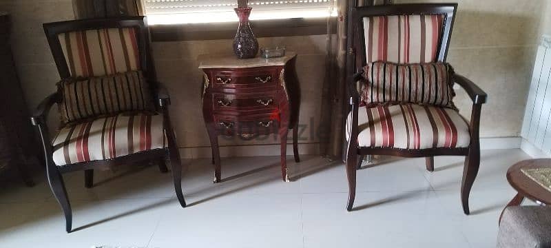 2 antiques bergeres with small antique table 2