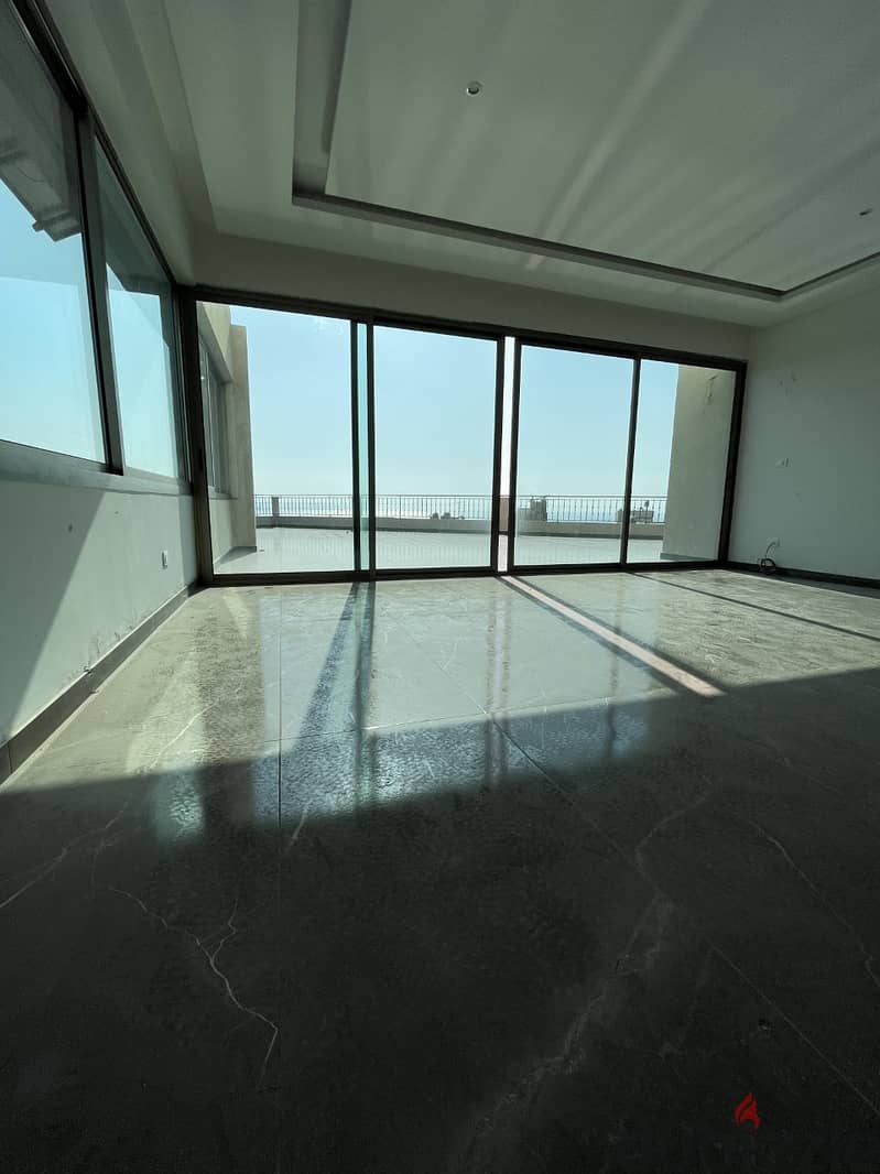 Unblocked Seaview apartment for sale in Dbayeh! REF#DF91164 1