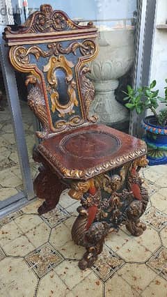 antique wood  chair carved and colored