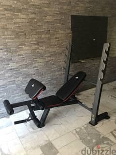bench adjustable like new with legs extension curl and biceps