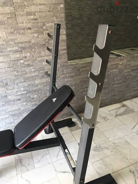 bench adjustable like new with legs extension curl and biceps 1