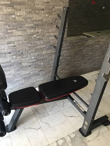 bench adjustable like new with legs extension curl and biceps 7