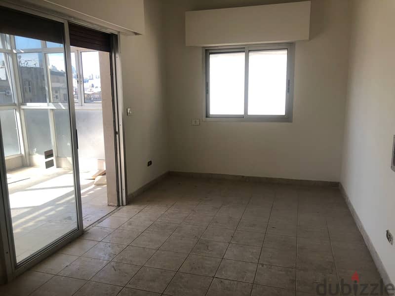 L11921- A 3-Bedroom Apartment for Rent in Badaro 24-Hour Electricity 2