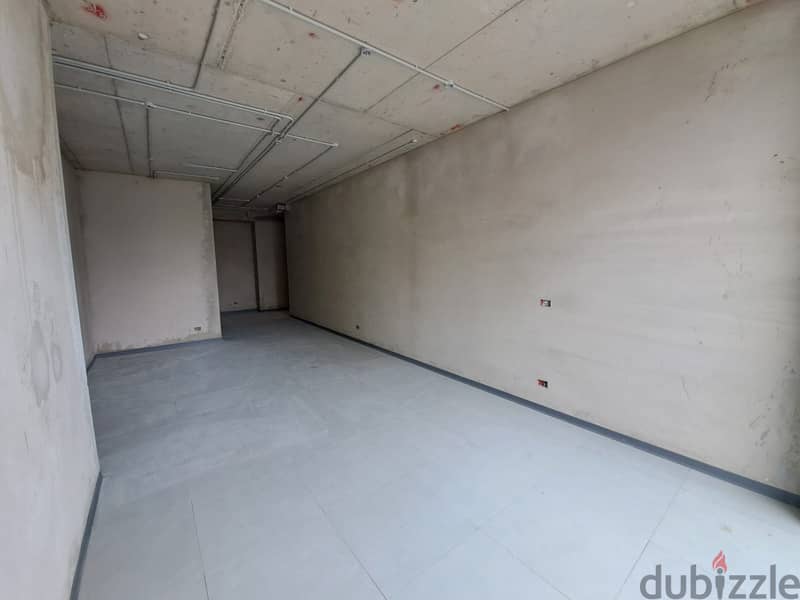 L11929-A 95 SQM Office In A Well Known Tower for Rent In Dekweneh 1