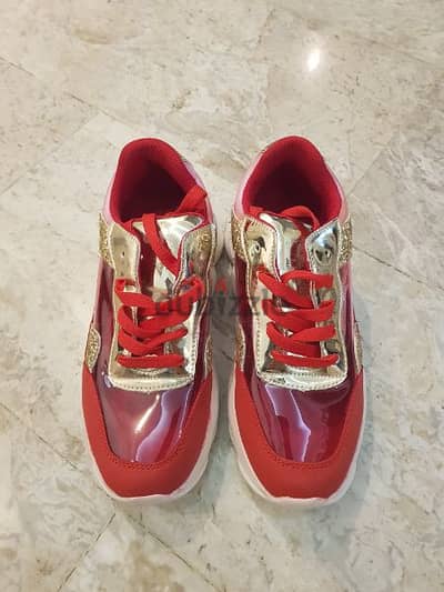 New red and gold shoes size 40