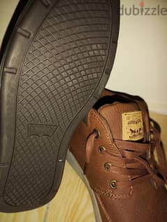 حذاء جديد غير مستعمل بتاتاً لون بني قياس ٤١. 0