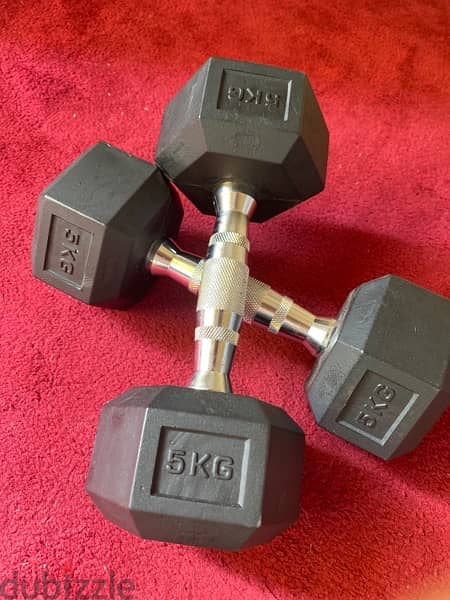 2 dumbells (5kg) 0