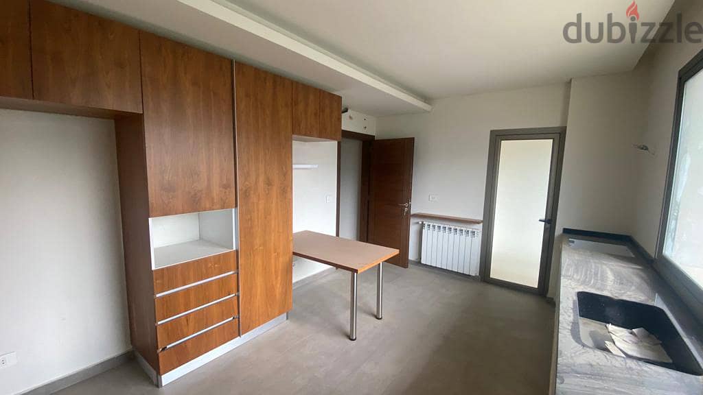 L12001- A 3-Bedroom Apartment for Rent in Aoukar 1