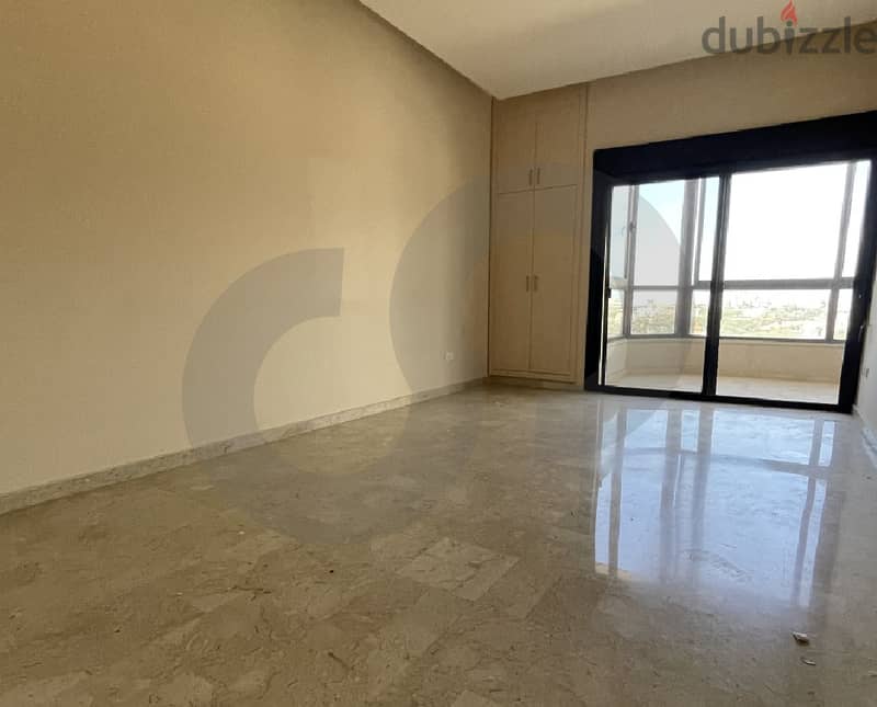 195 SQM apartment for sale in a very calm area in Awkar! REF#DF92220 1