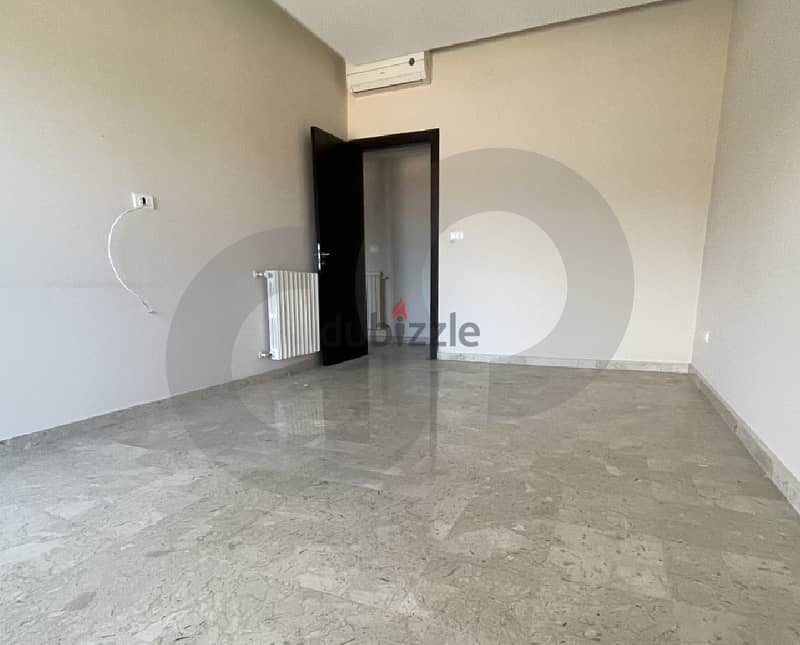 195 SQM apartment for sale in a very calm area in Awkar! REF#DF92220 3