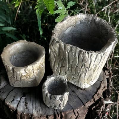 Small round concrete planters