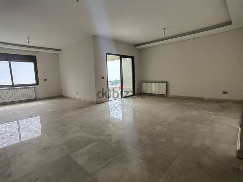 RWK186JS  - Apartment For Sale in Ballouneh - شقة للبيع في بلونة 1