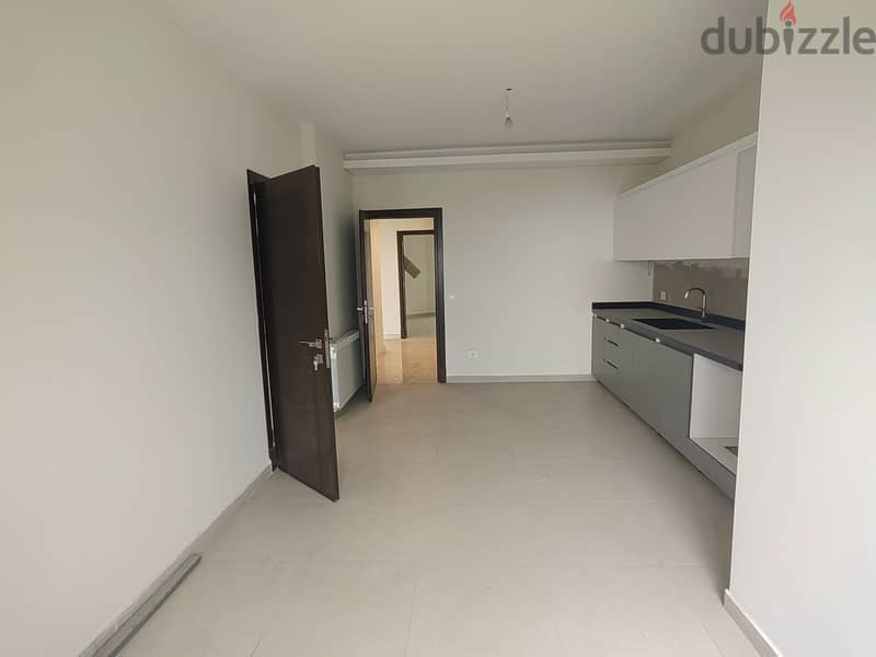 RWK186JS  - Apartment For Sale in Ballouneh - شقة للبيع في بلونة 7