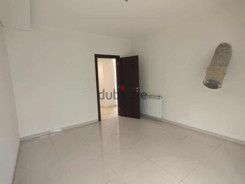 RWK186JS  - Apartment For Sale in Ballouneh - شقة للبيع في بلونة 10
