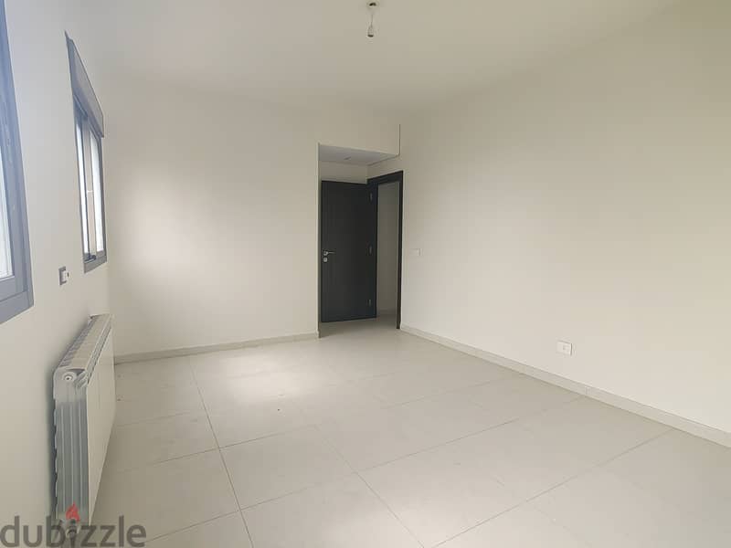 RWK186JS  - Apartment For Sale in Ballouneh - شقة للبيع في بلونة 9