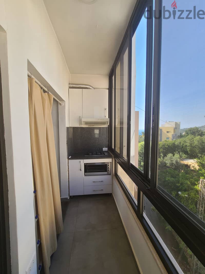 RWB173G - Apartment for sale in Amchit Jbeil شقة للبيع في عمشيت جبيل 2
