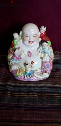 Buda porcelain statue