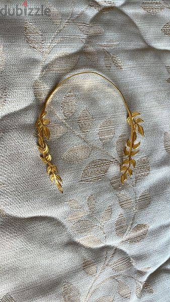 gold colored head band 0