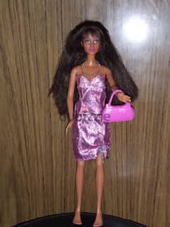 CALI GIRL LEA Mattel 2005 Barely used Still good doll, bend legs=16$