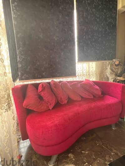 pink curved sofa