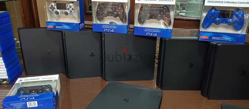 playstation 4 slim European with 2 controller all cable and 2 games 4