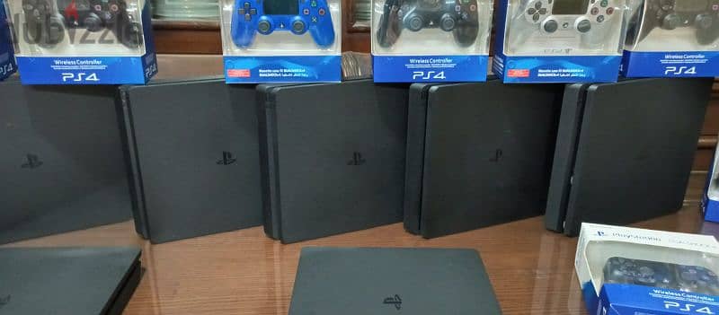 playstation 4 slim European with 2 controller all cable and 2 games 9