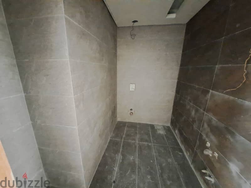 High-end finishing Apartment with open view for Sale in Beit El Chaar! 8