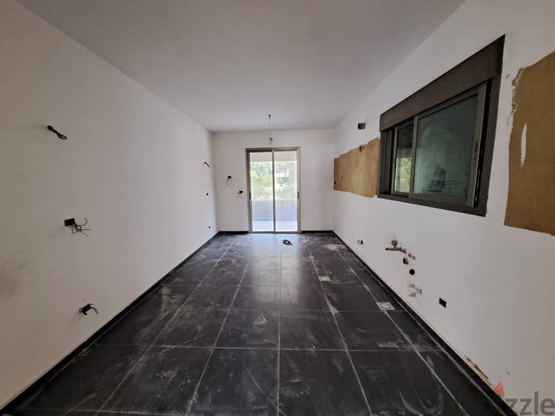 High-end finishing Apartment with open view for Sale in Beit El Chaar! 9