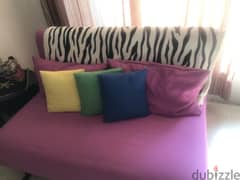 2 Sofa beds like new 1 tea pink, 1 purple + free carpet