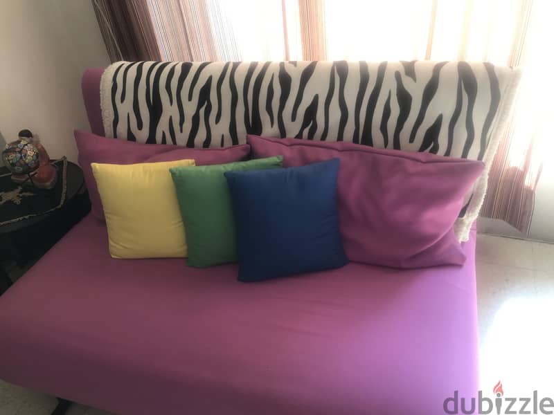 2 Sofa beds like new 1 tea pink, 1 purple + free carpet 0