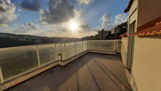 A 158 m2 apartment with a terrace and city view for sale in Mansourieh