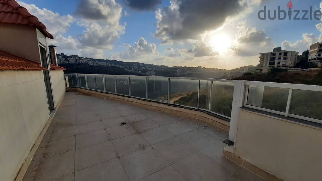 A 158 m2 apartment with a terrace and city view for sale in Mansourieh 1