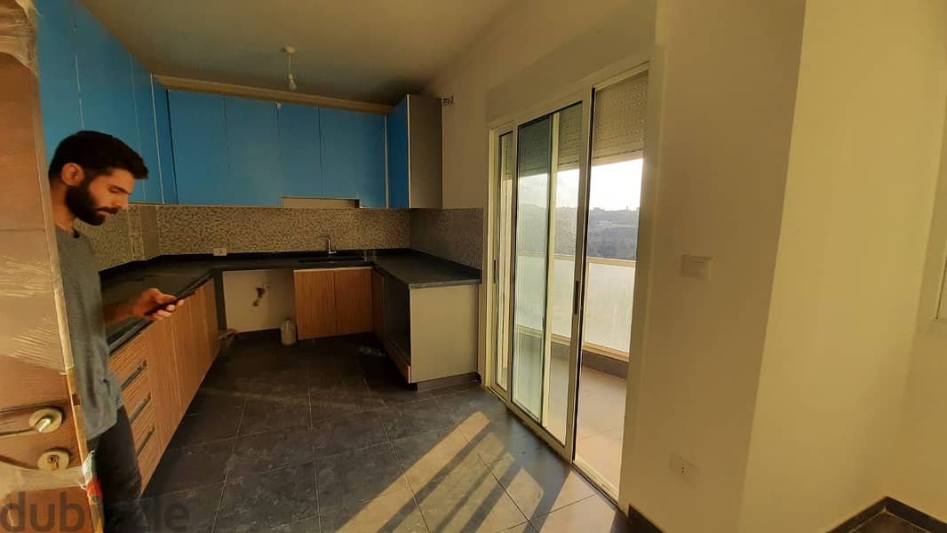 A 158 m2 apartment with a terrace and city view for sale in Mansourieh 5