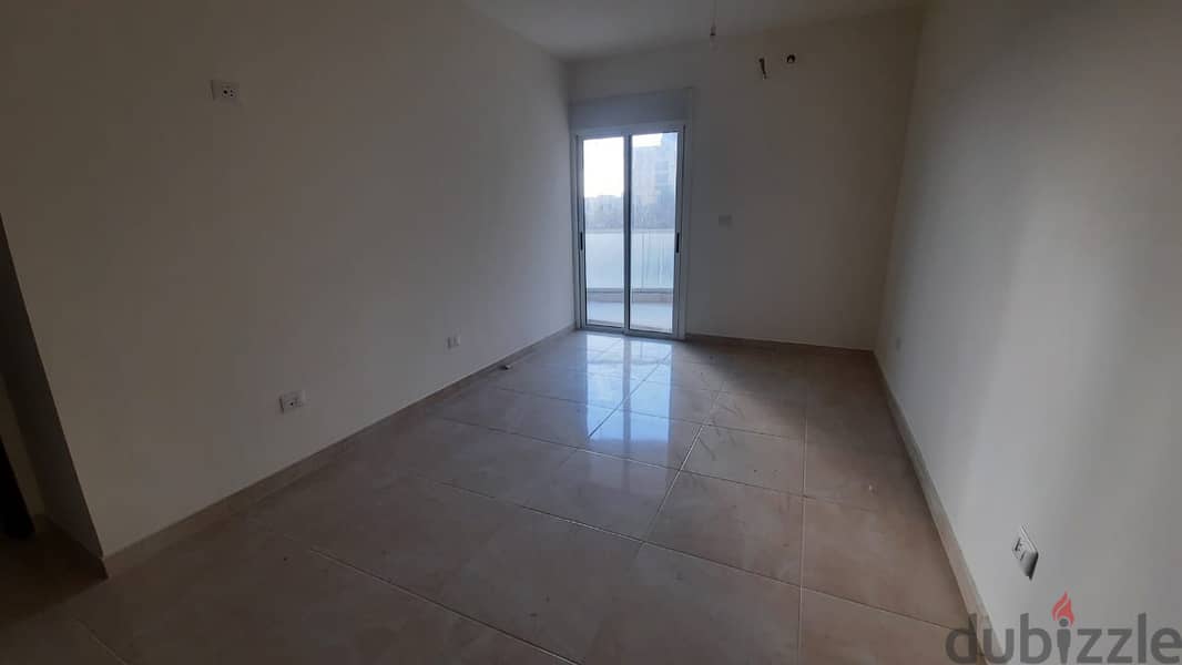 A 158 m2 apartment with a terrace and city view for sale in Mansourieh 7