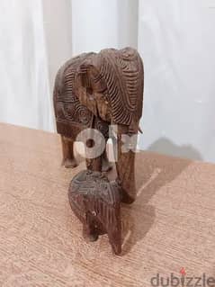 Two Antique Hand Carved Wooden Elephant Figurines 0