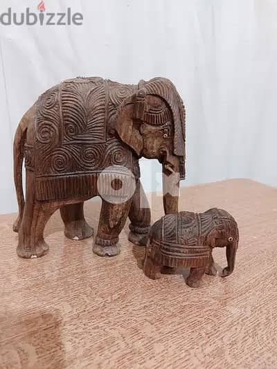 Two Antique Hand Carved Wooden Elephant Figurines 1