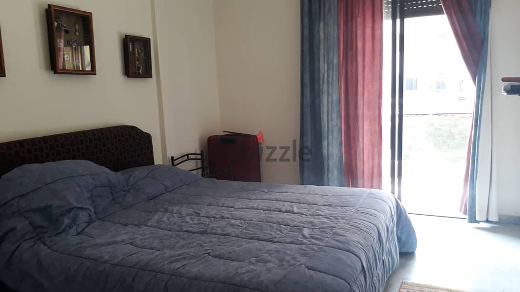 L12427-Spacious apartment for Rent in a gated community In Bsalim 1