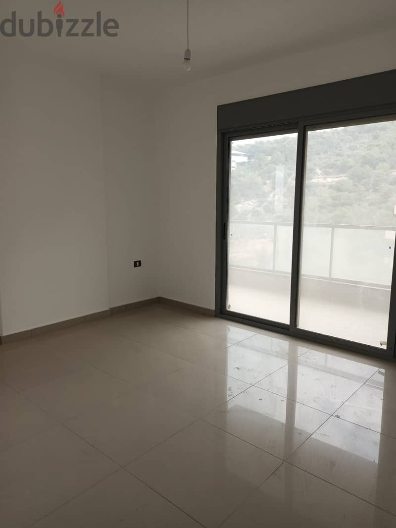 200m2 apartment having mountain/sea view for sale in Tilal Ain Saadeh 5