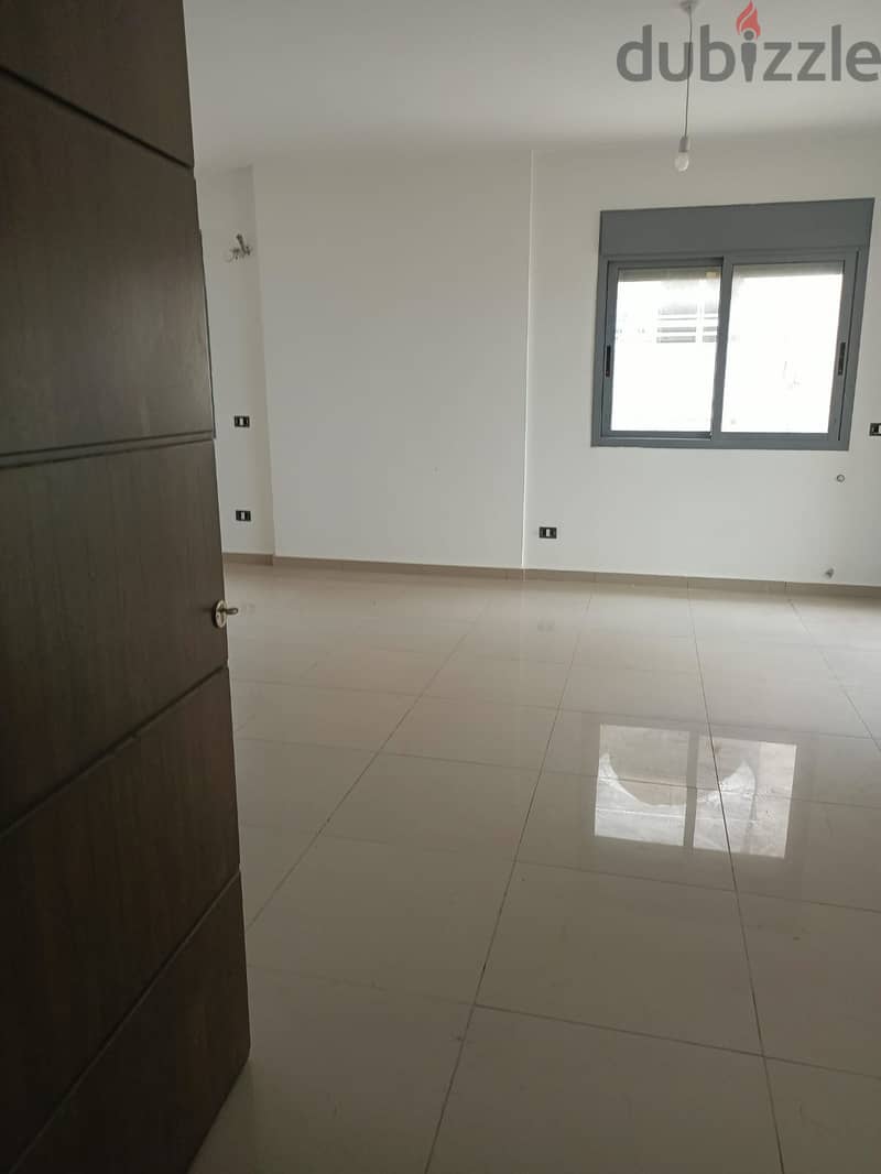 200m2 apartment having mountain/sea view for sale in Tilal Ain Saadeh 10