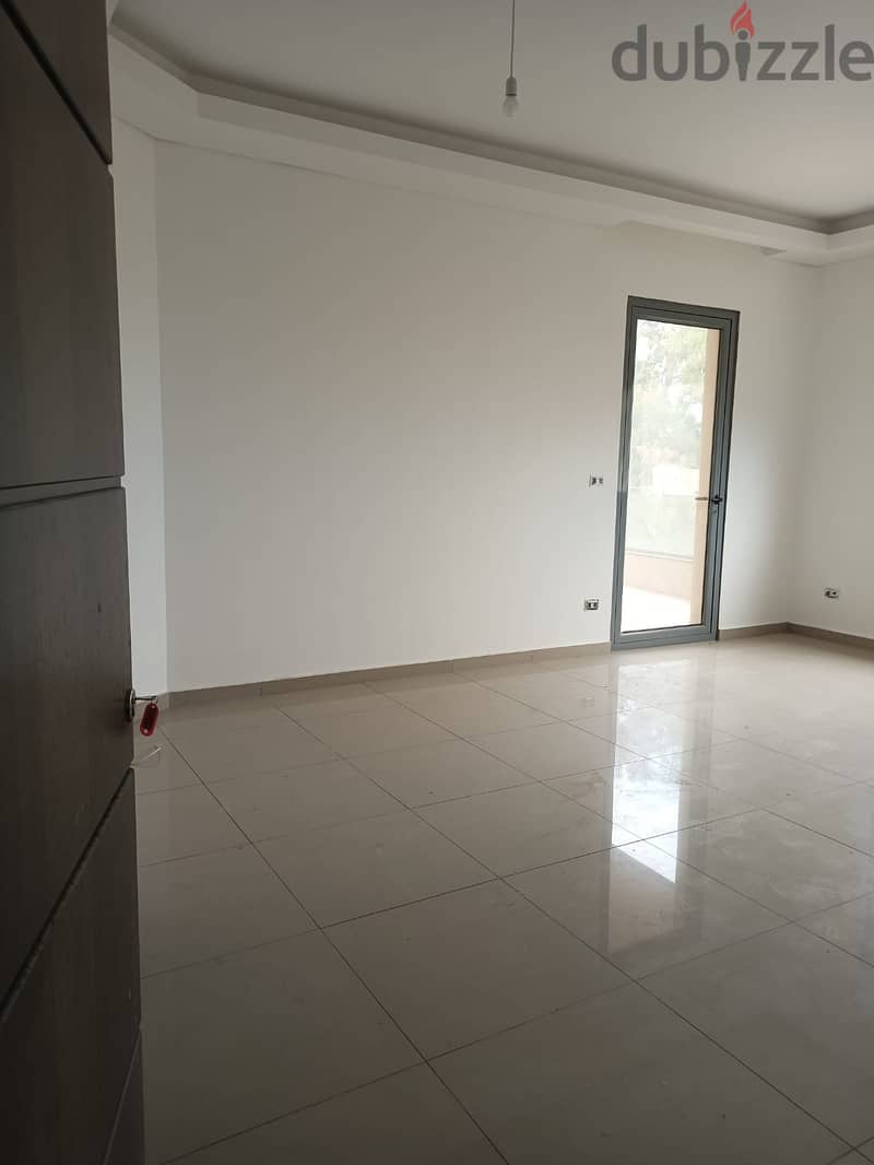 100m2 apartment having  mountain/sea view for sale in Tilal Ain Saadeh 3
