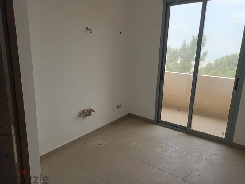 100m2 apartment having  mountain/sea view for sale in Tilal Ain Saadeh 7